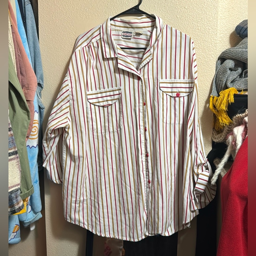 White button down with red and white stripes. Worn many times, 22w